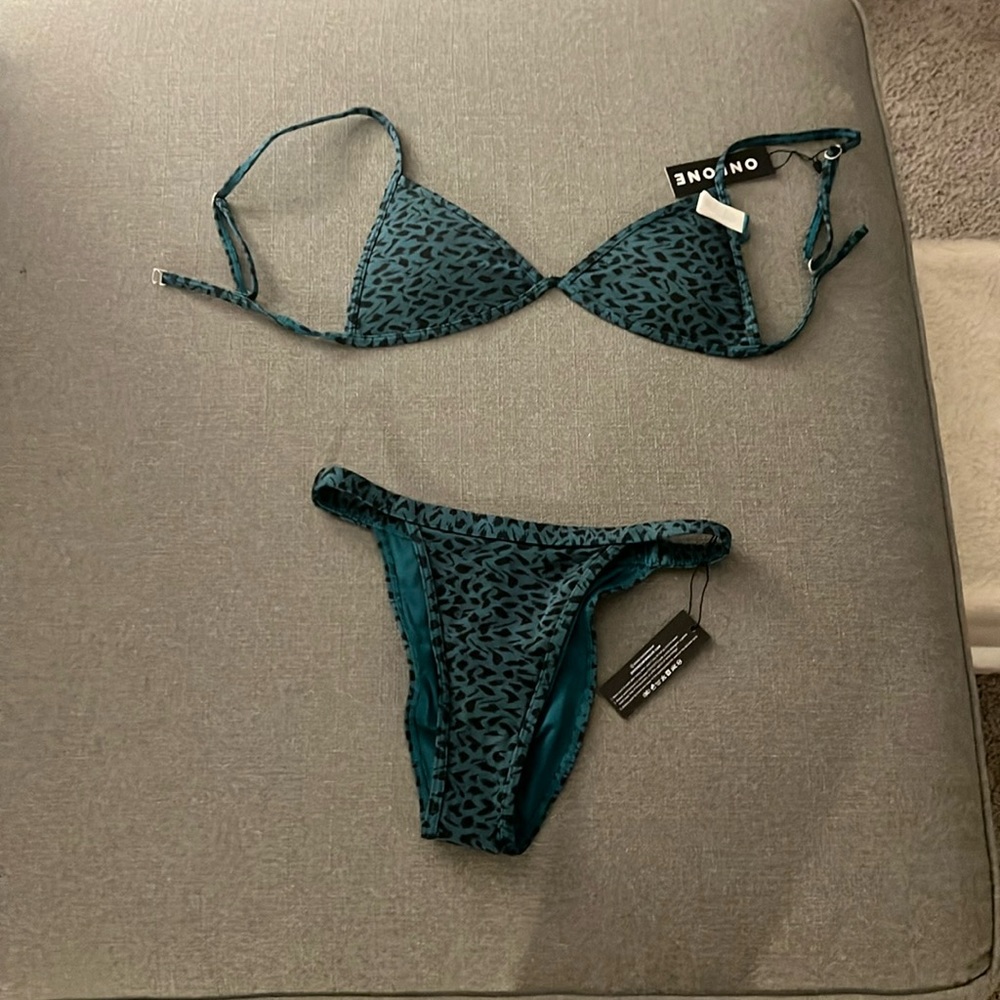 OneOne bikini pair. Large top medium bottoms.